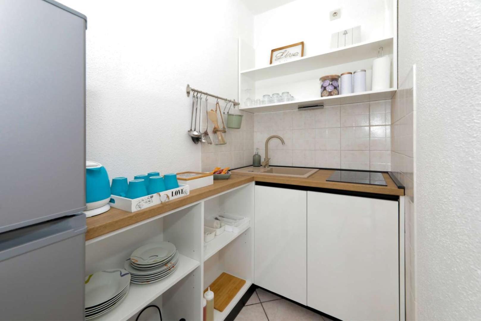 Apartments Lovric โตรกีร์ ภายนอก รูปภาพ