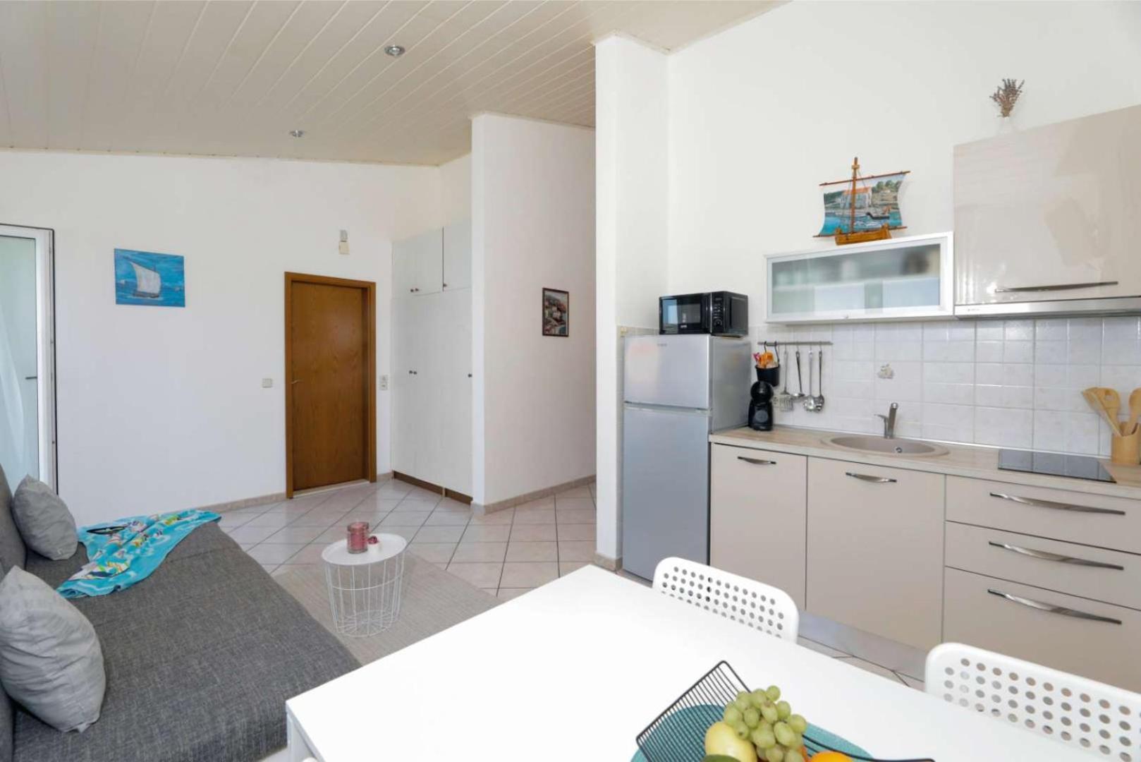 Apartments Lovric โตรกีร์ ภายนอก รูปภาพ